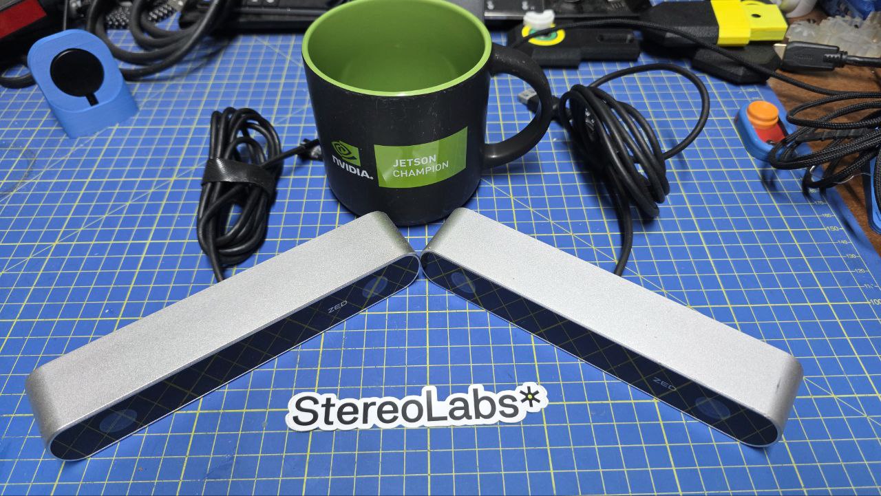 My two ZED cameras and my Jetson Champion mug